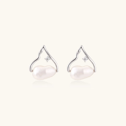 Silver mountain outline studs with baroque pearl and diamond accent on white background