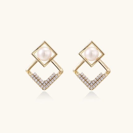 Gold-plated double square frame earrings with freshwater pearl and crystal accents on white background