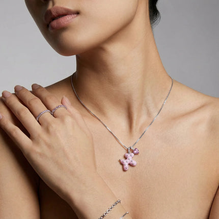 Halskette mit rosa Kreuz und Herz