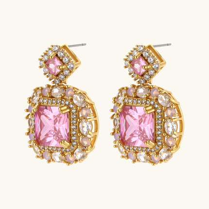 14K gold-plated jewelry set featuring square-cut cubic zirconia stones in ornate layered settings on white background.