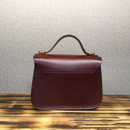 Vintage-Inspired Cream Leather Messenger Bag – Tree-Embossed Design